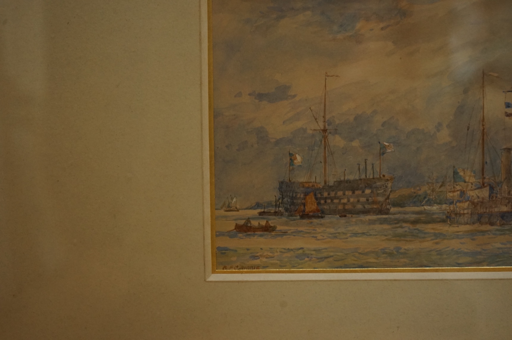 Bernard Finegan Gribble (1873-1962), watercolour, A cruiser steaming past an old hulk anchored in the river, probably Medway, signed, 17 x 25cm